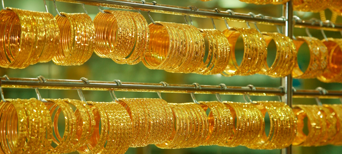shop racks of gold bangles